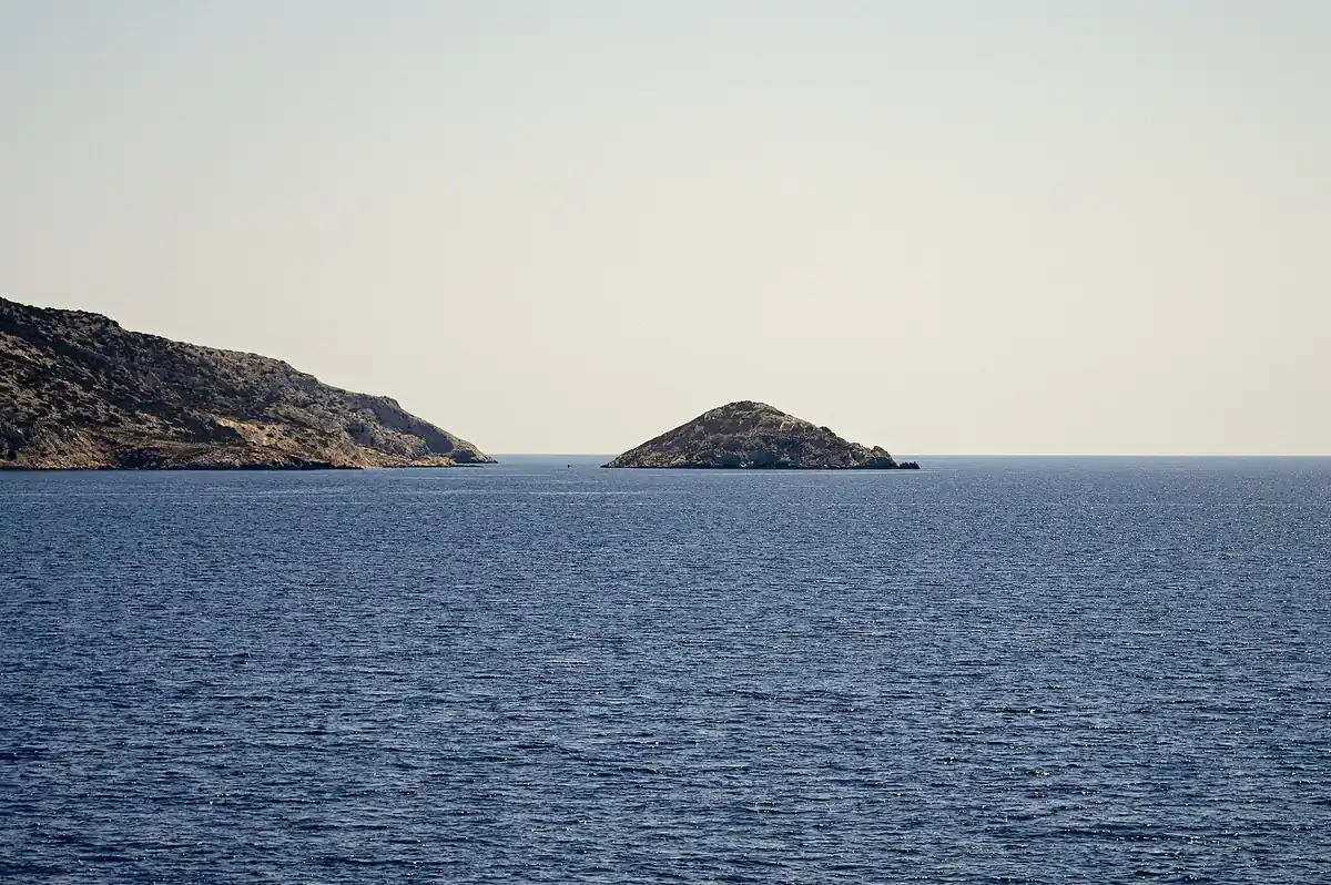 The open deck of a ferry crossing the Aegean, with the sea behind.