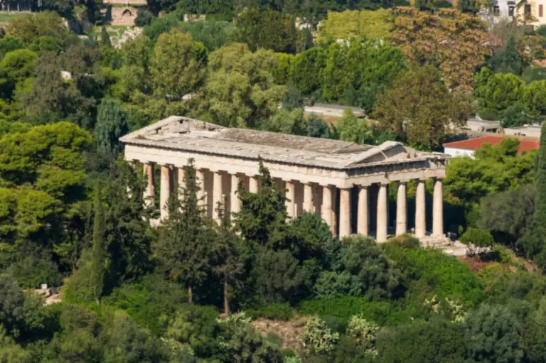The temple of Hephaestus in the Ancient Agora of Athens, among the trees.