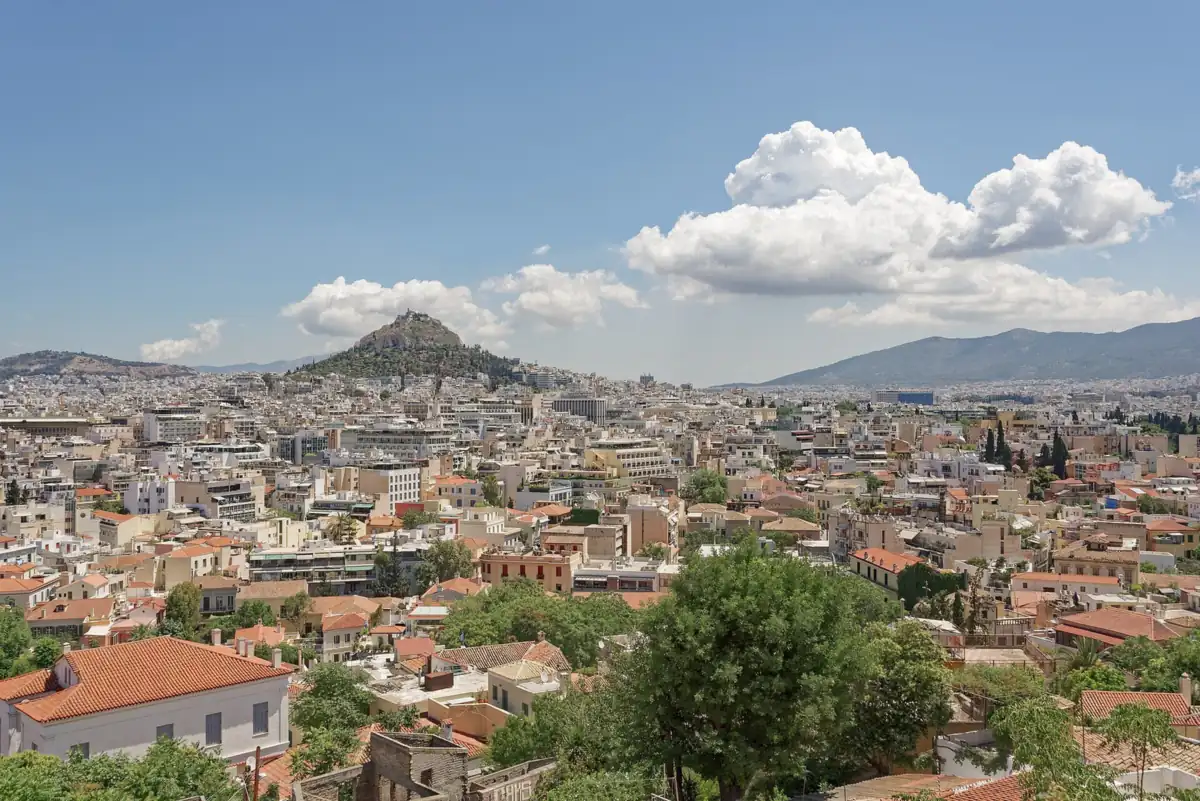 The rooftops of central Athens and Mount Lycabettus, seen from Anafiotika under the Acropolis.