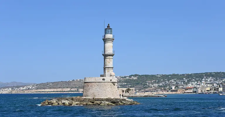 The Venetian lighthouse at the mouth of the old harbor of Chania, Crete.