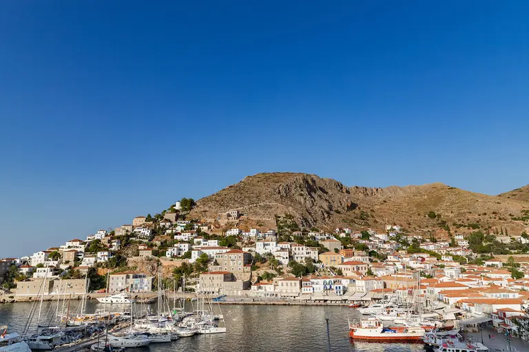 The harbor of Hydra, with its stone houses rising around the port.