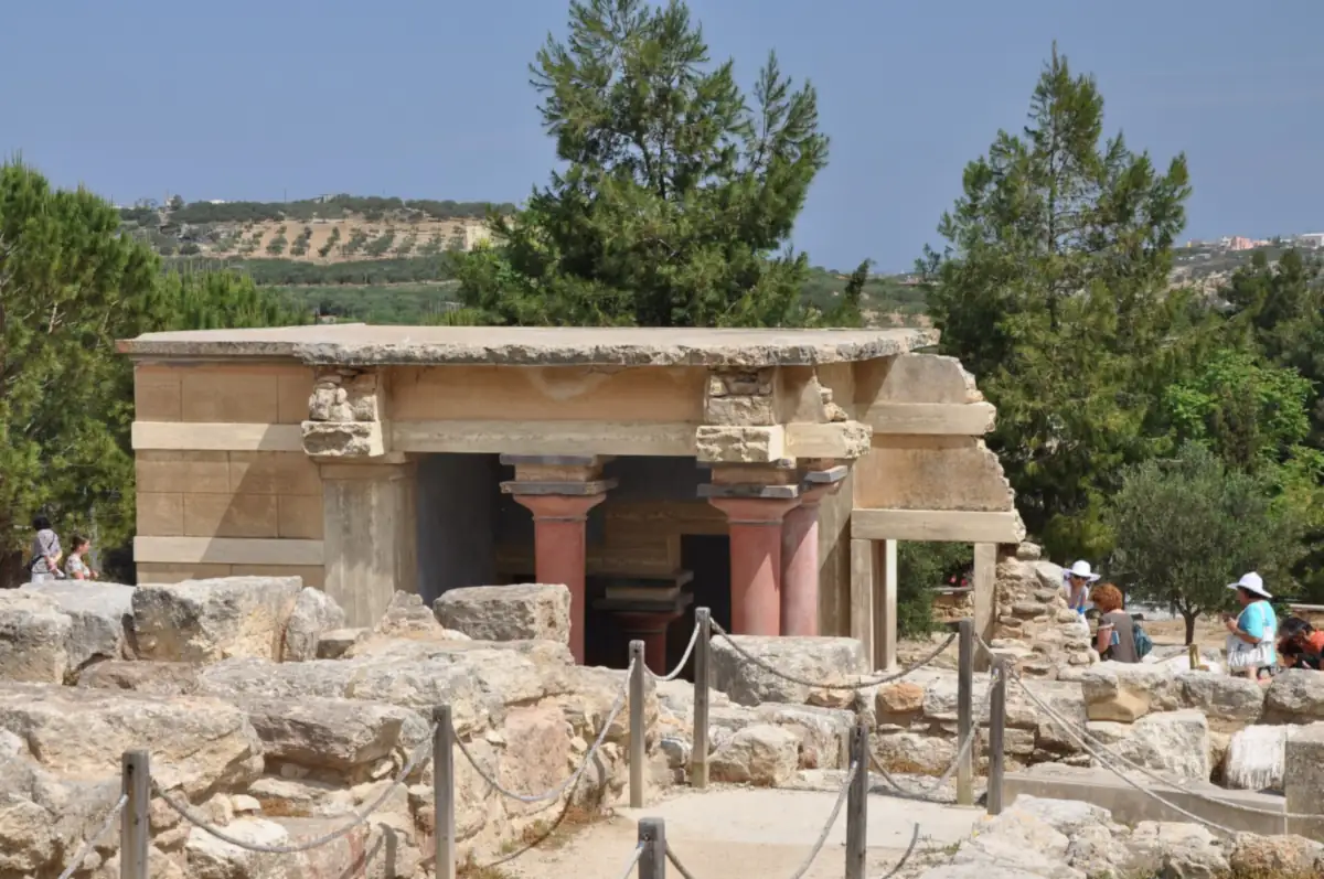 The restored northwest portico at the palace of Knossos, Crete, with its red columns.