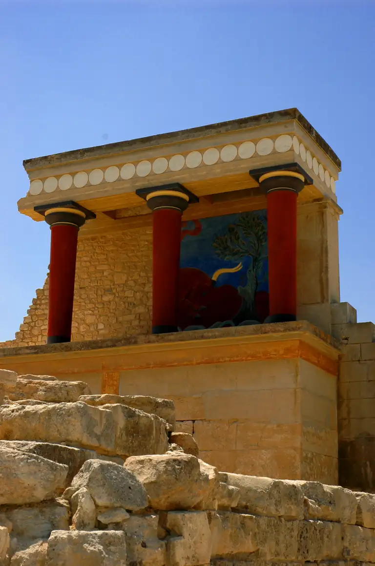 The red columns and restored walls of the palace of Knossos, Crete.
