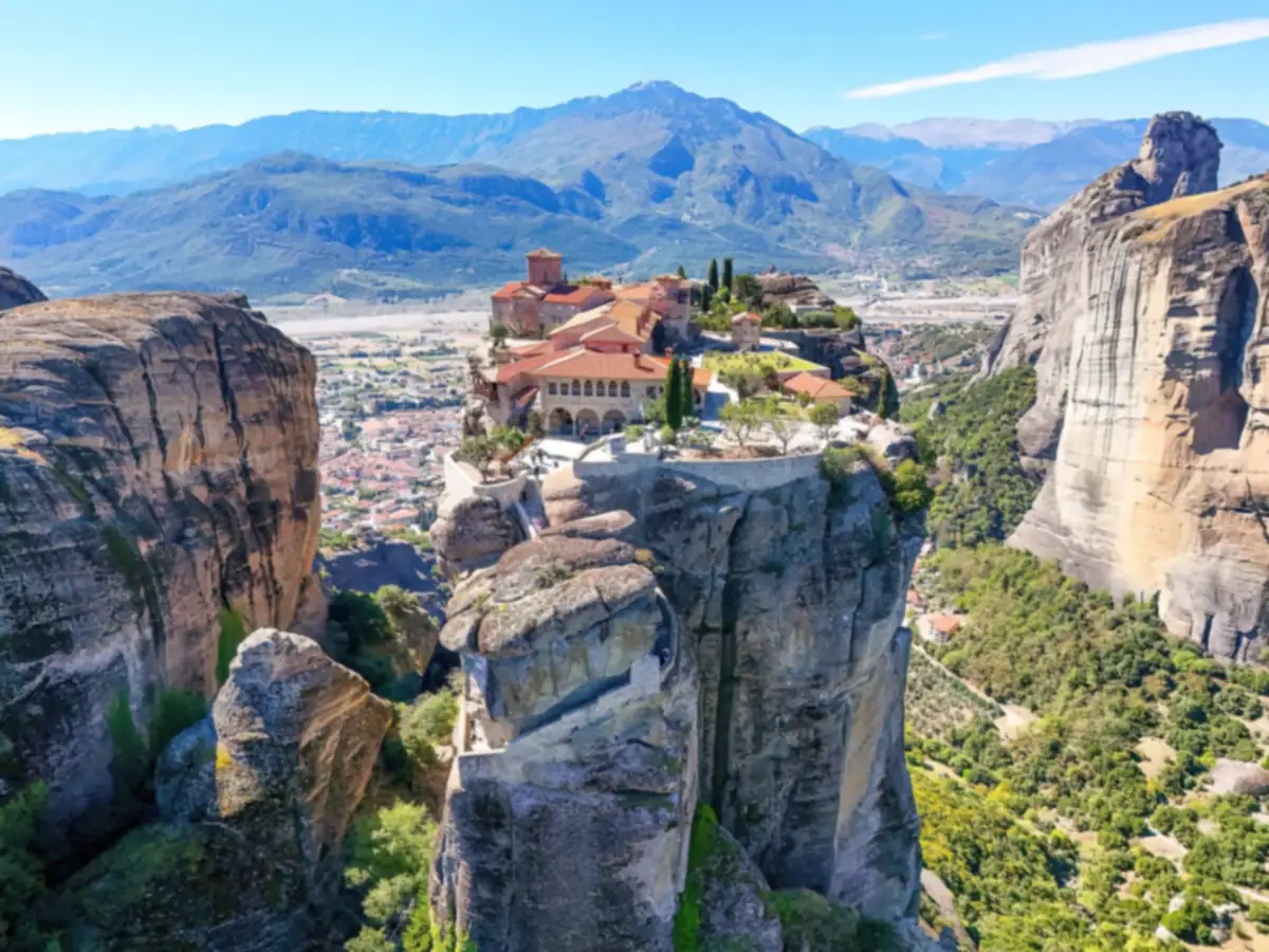 The monastery of the Holy Trinity on its rock pillar at Meteora, with Kalambaka on the plain below.