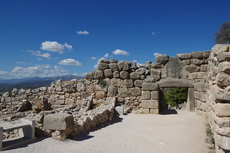 The walls and gate of the citadel of Mycenae, built of huge stone blocks.