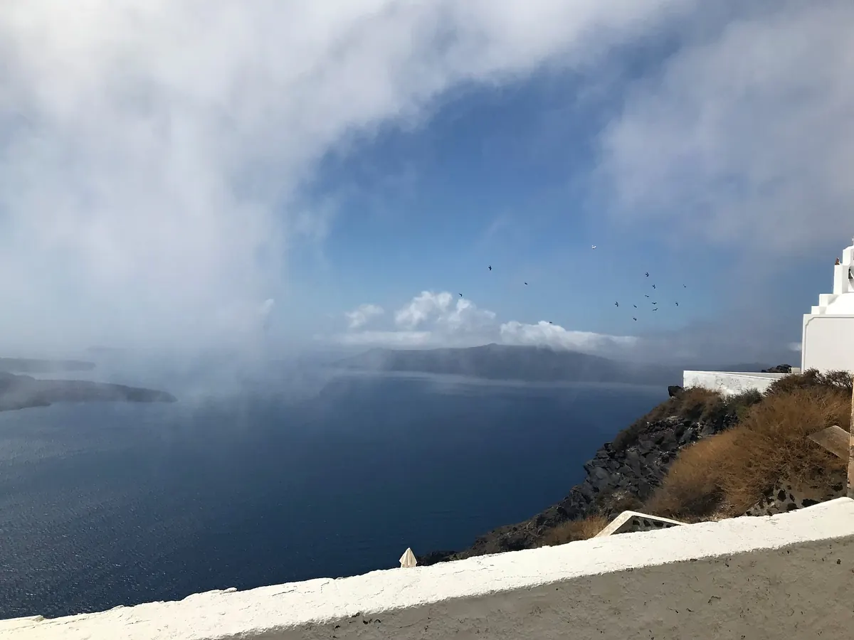 The caldera of Santorini from Imerovigli, with the white houses on the rim.