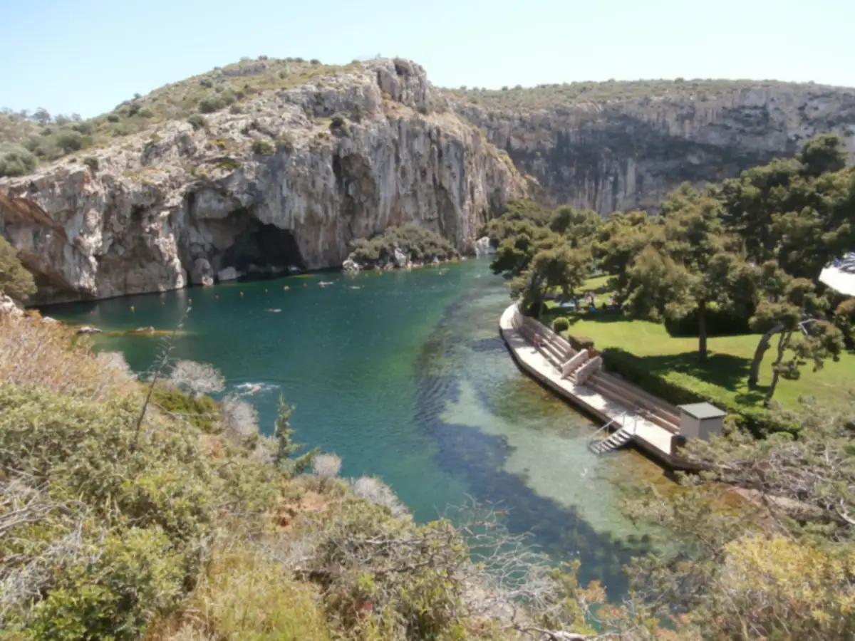 The lake at Vouliagmeni, on the coast south of Athens, under its cliff.